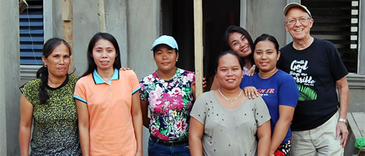 Fr. Vinnie Busch with Subanen crafters in the Philippines