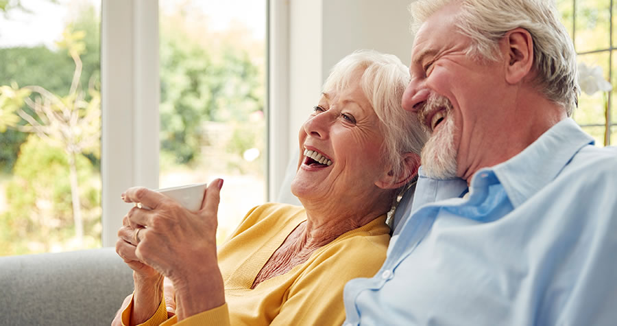 Couple relaxing and laughing