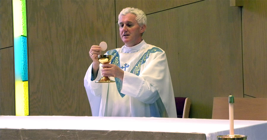 Columban Fr. Timothy Mulroy saying Mass