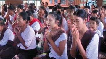 Young and old practice meditation