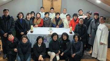 Fr. Thomas with parishioners