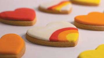 frosted cookies in the shape of a heart