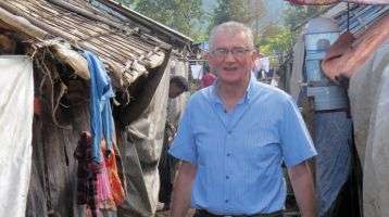 Fr. Neil Magill in an IDP camp