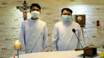 New Deacons Jerry Lohera (left) and Elbert Balbastro
