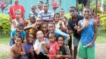 Andrew with new friends at Namosi village