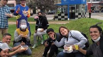 Parishioners helping Fr. Dylan distribute food