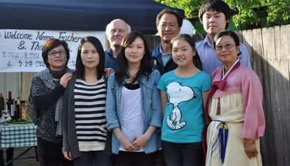 Kim Chong-hwan with his family and Columban Fr. Noel Daly on his 70th Birthday.