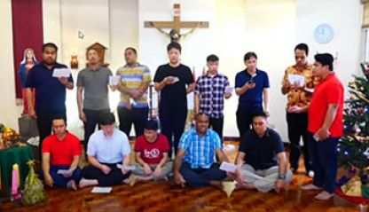 Columban seminarians sing Christmas songs.