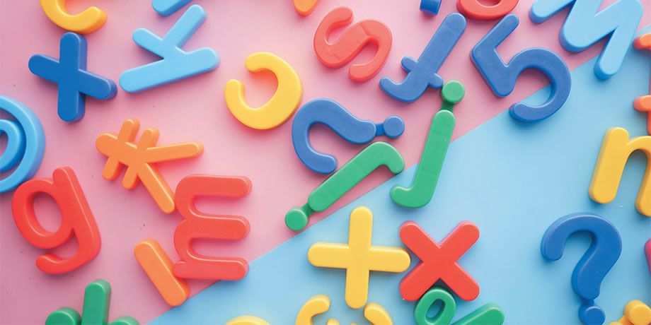 Letters, numbers and symbols on a board.
