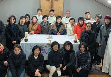 Fr. Thomas with parishioners