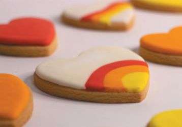 frosted cookies in the shape of a heart