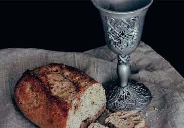 Bread and wine signifying the Body and Blood of Christ