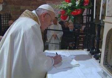 Pope Francis signing the Encyclical, Fratelli Tutti