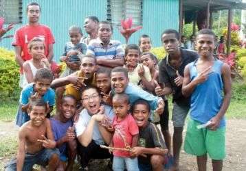 Andrew with new friends at Namosi village