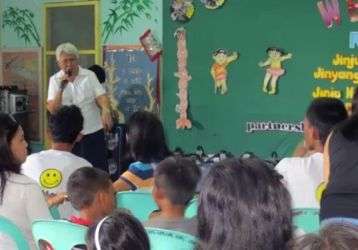 A Columban Sister speaks to a group at the Community of Hope Special Education Center in Ozamiz City, Philippines