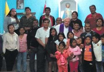 Fr. John Boles with parishioners